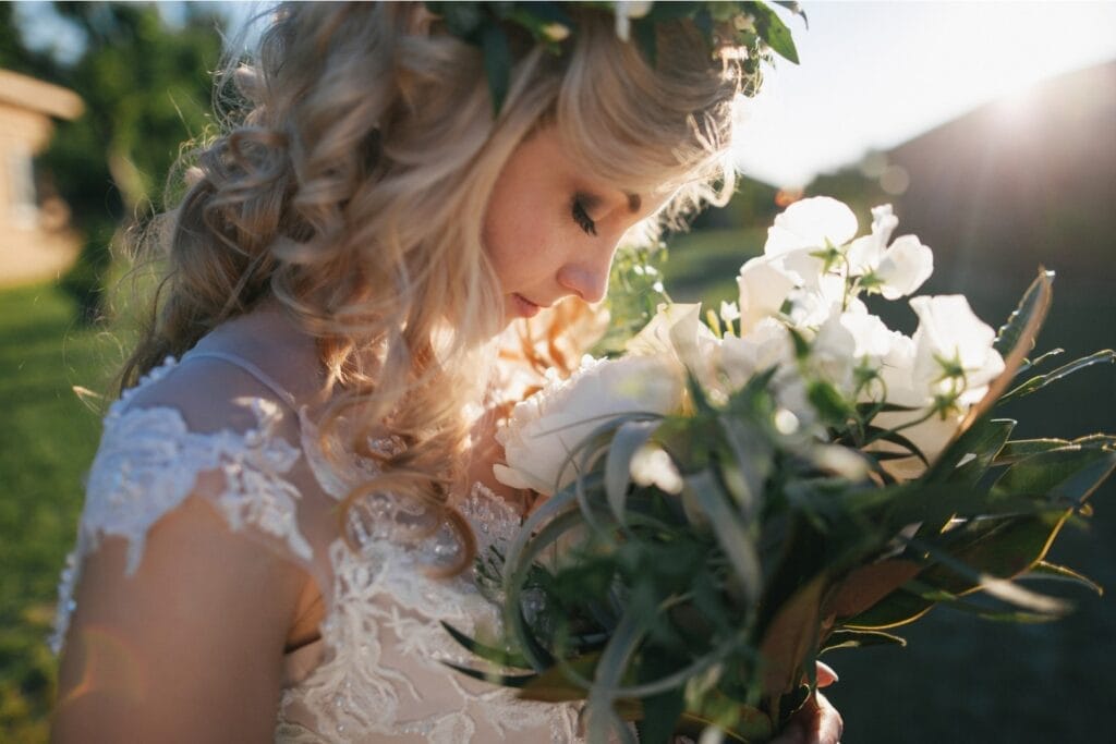 Uk wedding day checklist (2) A bride smelling flowers