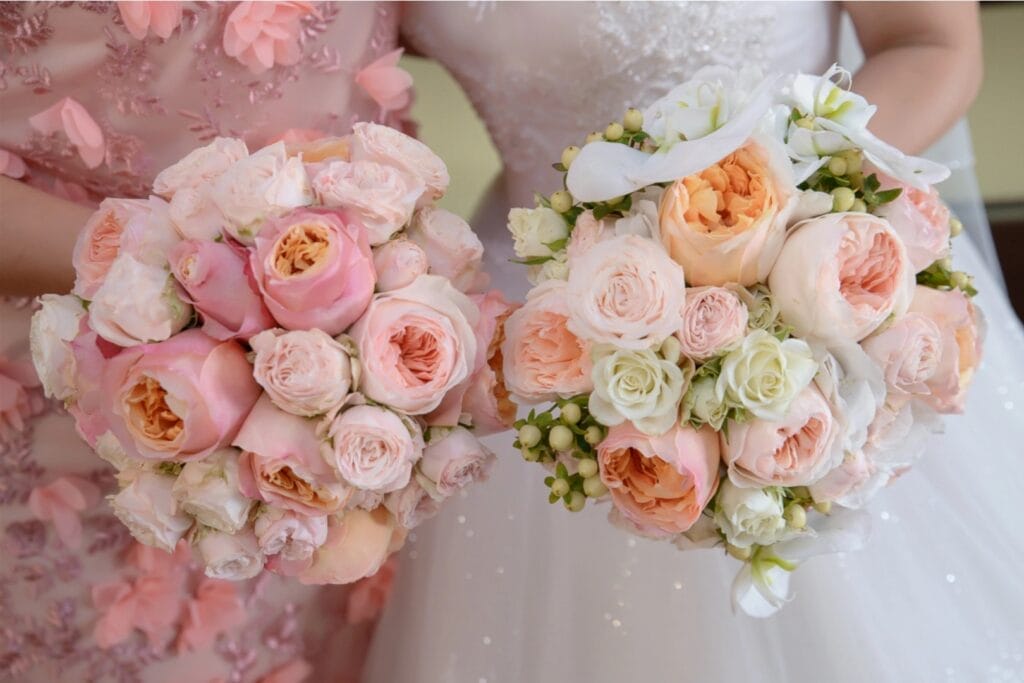 Wedding planning checklist UK (2) A bride and bridesmaid holding bouquet